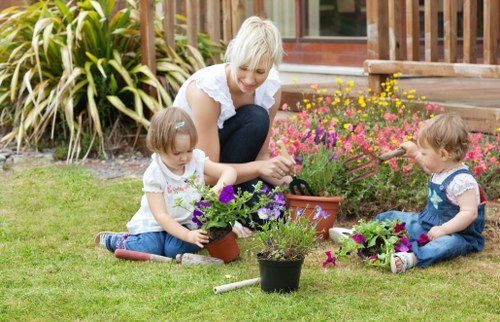 Seasonal garden maintenance in Carshalton with planting and border care