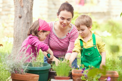 Experienced Carshalton gardeners preparing a garden for seasonal maintenance
